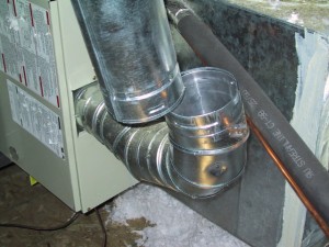 Unsafe furnace flue separation in attic